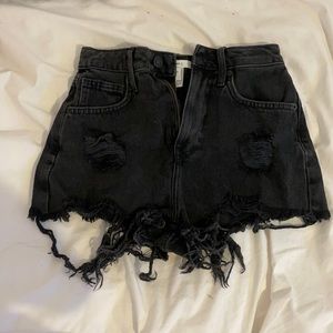 Black ripped shorts